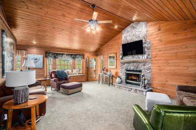 14965 Loon Lake Dr, Bellevue, MI 49021 - living room featuring plenty of natural light, wood walls, wood ceiling, vaulted ceiling, and carpet floors
