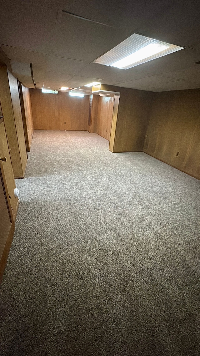 9988 Stout St, Detroit, MI 48228 - finished basement featuring light carpet and wooden walls