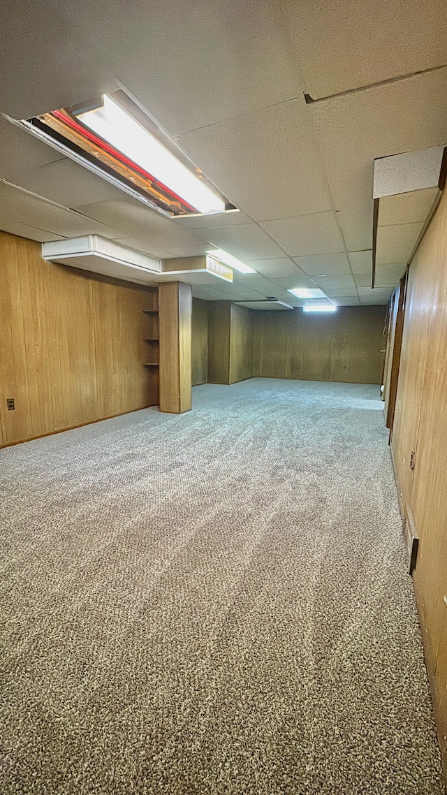 9988 Stout St, Detroit, MI 48228 - finished basement featuring carpet flooring and wooden walls