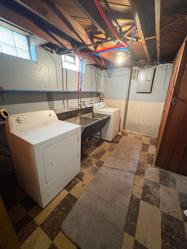 9988 Stout St, Detroit, MI 48228 - washroom with tile patterned floors, separate washer and dryer, and electric panel