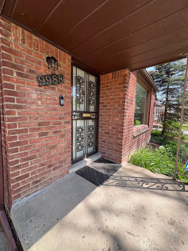 9988 Stout St, Detroit, MI 48228 - view of exterior entry with brick siding