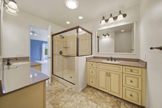 1287 Deer Run, Grass Lake, MI 49240 - bathroom featuring vanity, a stall shower, and a ceiling fan