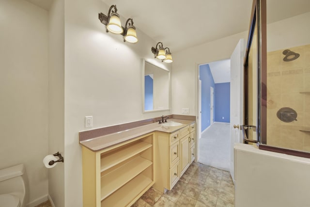 1287 Deer Run, Grass Lake, MI 49240 - bathroom featuring toilet, vanity, and tiled shower