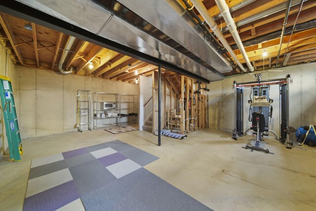 1287 Deer Run, Grass Lake, MI 49240 - unfinished basement featuring stairs