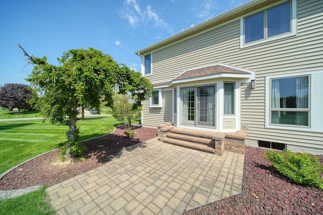 1287 Deer Run, Grass Lake, MI 49240 - rear view of house with a yard, a patio, and entry steps