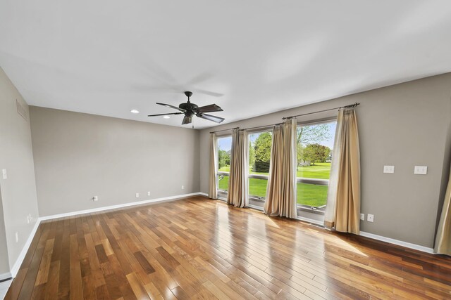 1287 Deer Run, Grass Lake, MI 49240 - unfurnished room with a ceiling fan, wood-type flooring, baseboards, and recessed lighting