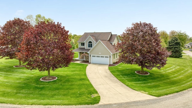 1287 Deer Run, Grass Lake, MI 49240 - view of front of property featuring concrete driveway, a front yard, an attached garage, and a shingled roof