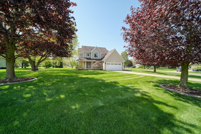 1287 Deer Run, Grass Lake, MI 49240 - traditional home with an attached garage, a front yard, and driveway