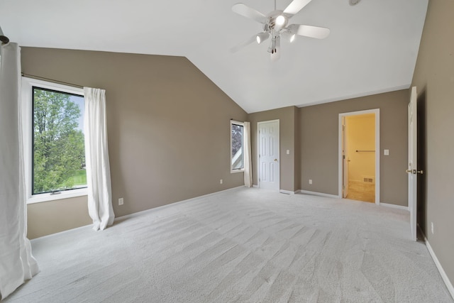 1287 Deer Run, Grass Lake, MI 49240 - unfurnished bedroom featuring carpet floors, vaulted ceiling, baseboards, and a ceiling fan