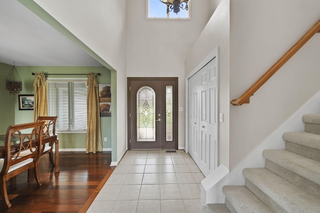 1287 Deer Run, Grass Lake, MI 49240 - foyer featuring stairway, baseboards, and light wood-style floors