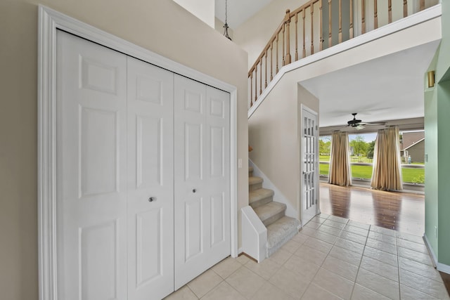 1287 Deer Run, Grass Lake, MI 49240 - stairs with a ceiling fan, tile patterned floors, baseboards, and french doors