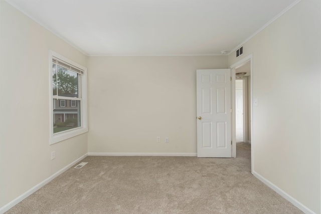 1141 Marquette Ct, Rochester Hills, MI 48307 - spare room featuring light colored carpet, crown molding, and baseboards