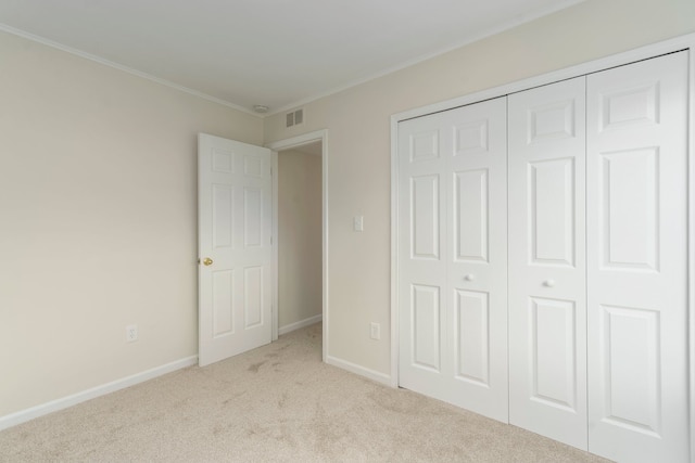1141 Marquette Ct, Rochester Hills, MI 48307 - unfurnished bedroom featuring carpet flooring, ornamental molding, a closet, and baseboards