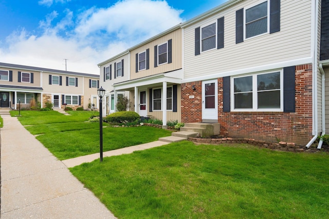 1141 Marquette Ct, Rochester Hills, MI 48307 - view of property featuring brick siding and a front yard
