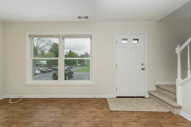 1141 Marquette Ct, Rochester Hills, MI 48307 - entryway with stairway, wood finished floors, baseboards, and crown molding