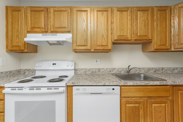 1141 Marquette Ct, Rochester Hills, MI 48307 - kitchen with white appliances, a sink, under cabinet range hood, and light countertops