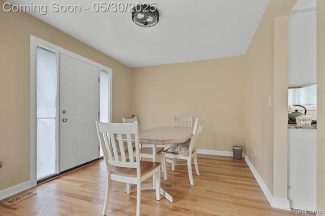 29290 Prestwick St, Southfield, MI 48076 - dining area with light wood-style flooring, baseboards, and plenty of natural light