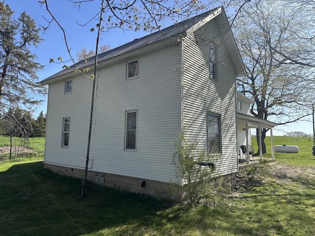 5342 E Fountain Rd, Fountain, MI 49410 - view of home's exterior with a lawn