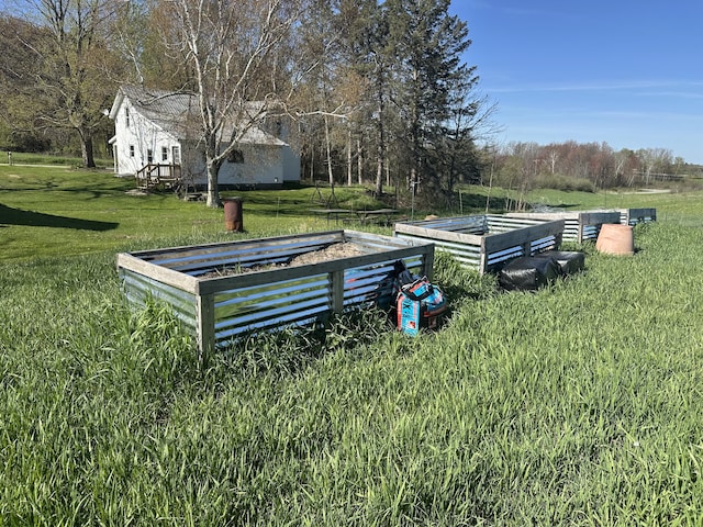 5342 E Fountain Rd, Fountain, MI 49410 - view of grassy yard featuring a garden