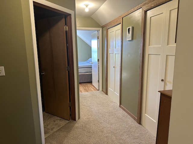 5342 E Fountain Rd, Fountain, MI 49410 - corridor featuring carpet floors and vaulted ceiling