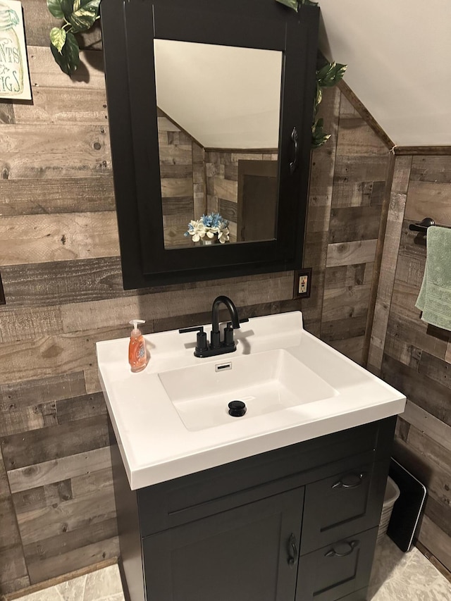 5342 E Fountain Rd, Fountain, MI 49410 - bathroom with wooden walls and vanity