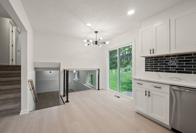 3884 Cass Elizabeth Rd, Waterford, MI 48328 - unfurnished living room featuring light wood finished floors, a textured ceiling, a chandelier, recessed lighting, and stairway