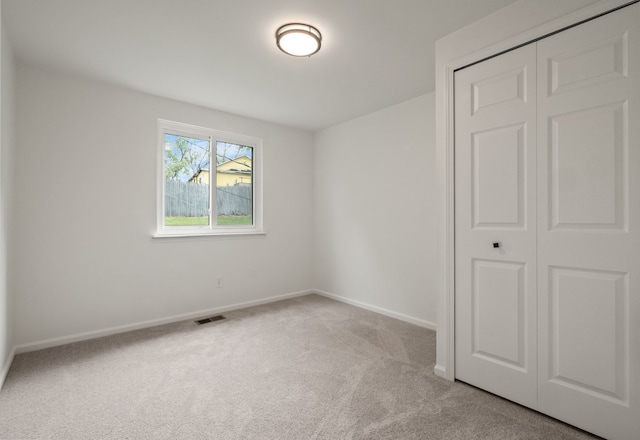 3884 Cass Elizabeth Rd, Waterford, MI 48328 - unfurnished bedroom with carpet flooring and a closet
