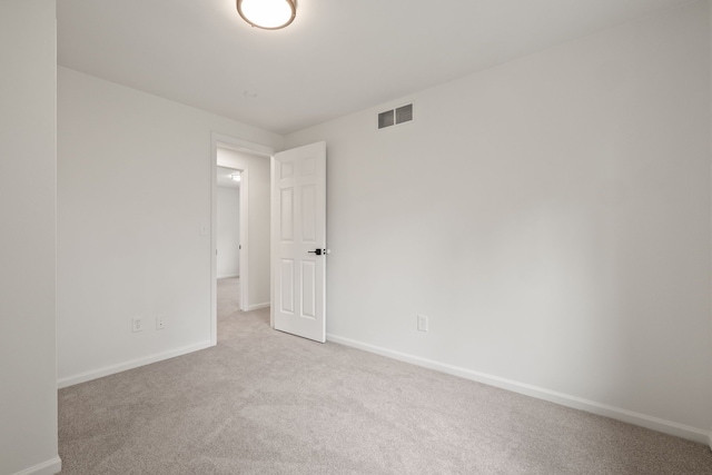 3884 Cass Elizabeth Rd, Waterford, MI 48328 - unfurnished room with light colored carpet and baseboards