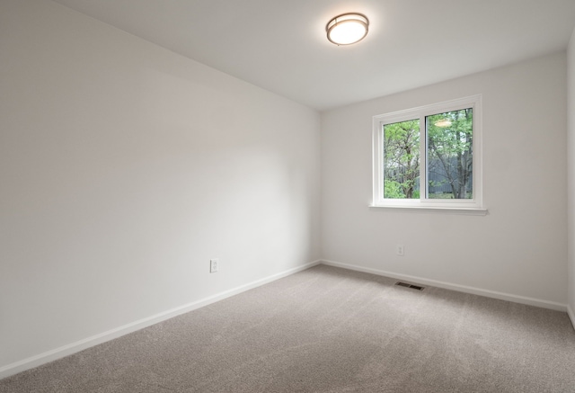 3884 Cass Elizabeth Rd, Waterford, MI 48328 - unfurnished room with baseboards and light carpet