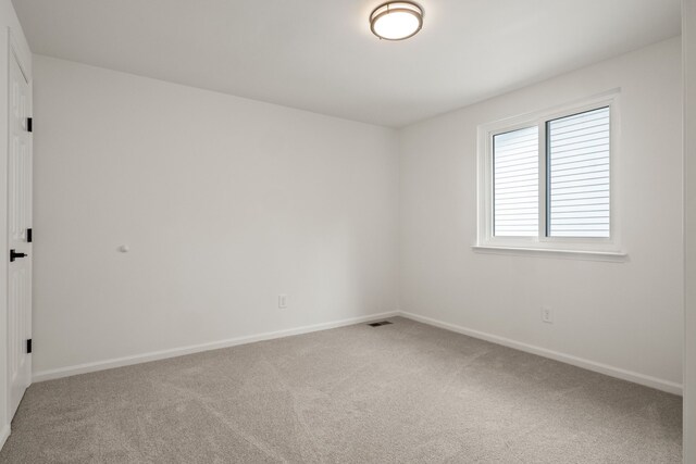 3884 Cass Elizabeth Rd, Waterford, MI 48328 - unfurnished room with light colored carpet and baseboards
