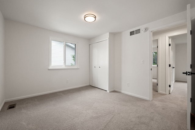 3884 Cass Elizabeth Rd, Waterford, MI 48328 - unfurnished bedroom featuring carpet flooring and a closet