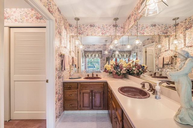 2103 E Newark Rd, Lapeer, MI 48446 - full bath featuring wallpapered walls, double vanity, and tile patterned floors