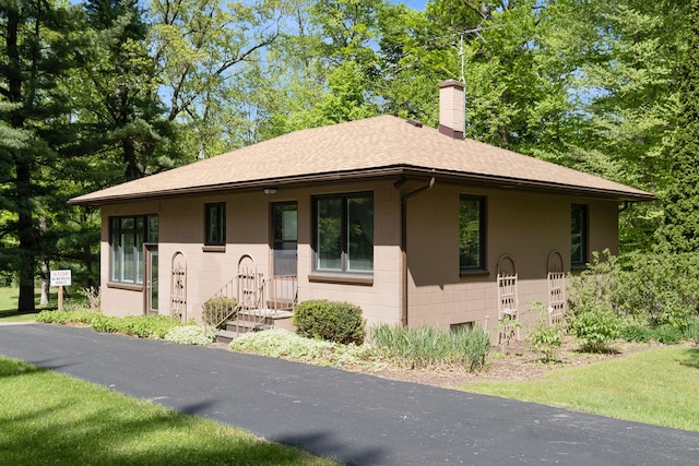 2103 E Newark Rd, Lapeer, MI 48446 - ranch-style house with a chimney and a shingled roof