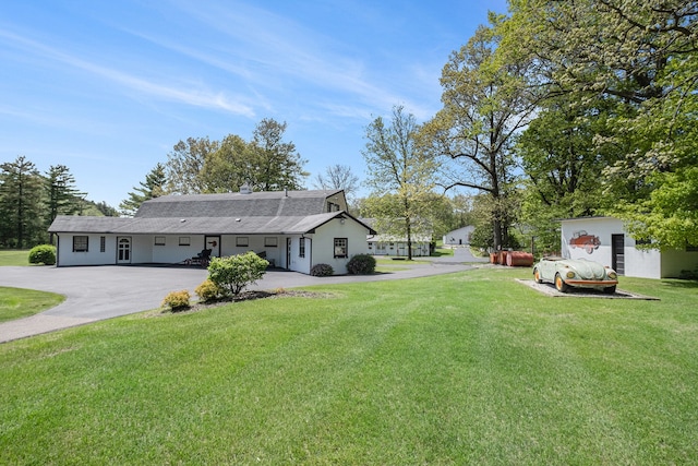 2103 E Newark Rd, Lapeer, MI 48446 - view of green lawn featuring driveway