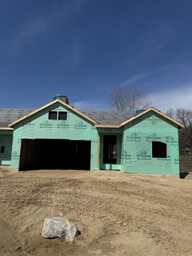 1537 N Village Cir, Kalamazoo, MI 49009 - unfinished property featuring an attached garage