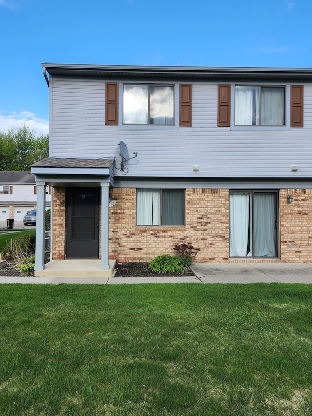 50013 S Jimmy, Chesterfield, MI 48047 - view of front facade featuring brick siding and a front yard