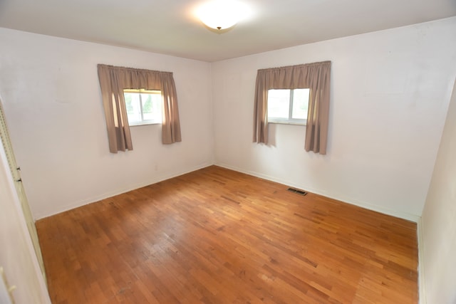 11365 Runnells Dr, Clio, MI 48420 - empty room featuring light wood finished floors and baseboards