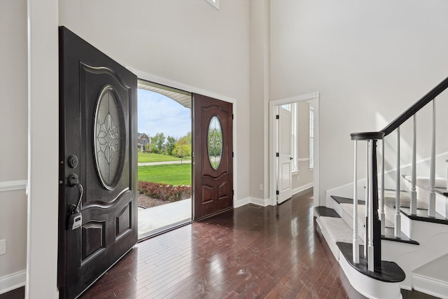 1840 Tapadera Dr, Ann Arbor, MI 48103 - entryway featuring stairway, hardwood / wood-style flooring, baseboards, and a towering ceiling