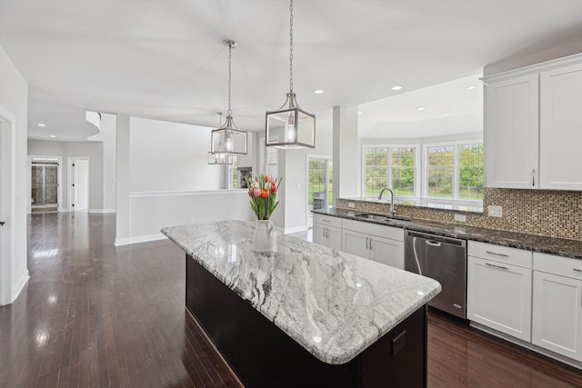 1840 Tapadera Dr, Ann Arbor, MI 48103 - kitchen with dishwasher, a sink, backsplash, a center island, and recessed lighting