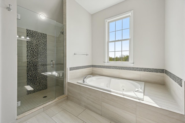 1840 Tapadera Dr, Ann Arbor, MI 48103 - full bathroom featuring a jetted tub, a stall shower, and tile patterned flooring