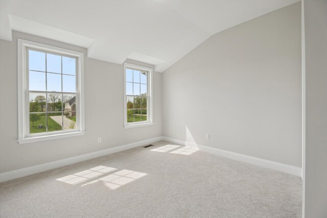 1840 Tapadera Dr, Ann Arbor, MI 48103 - spare room with lofted ceiling, baseboards, and carpet flooring