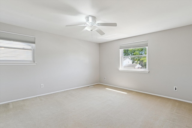 2374 Berwick Dr, Canton, MI 48188 - spare room featuring carpet, a ceiling fan, and baseboards