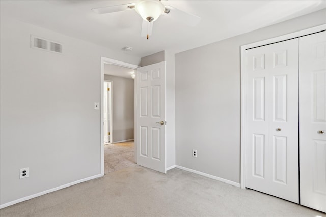 2374 Berwick Dr, Canton, MI 48188 - unfurnished bedroom with light carpet, a closet, baseboards, and a ceiling fan