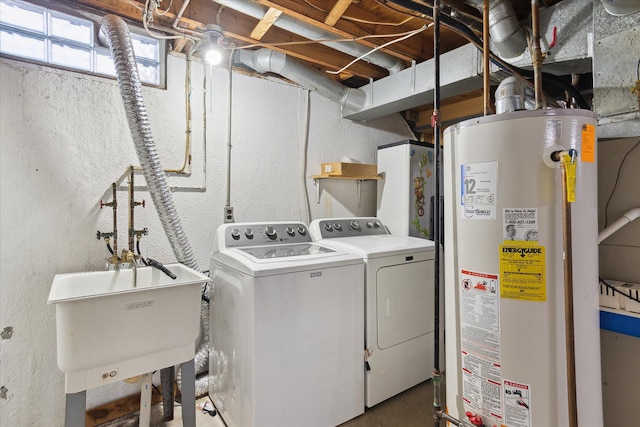 2374 Berwick Dr, Canton, MI 48188 - washroom with gas water heater, washer and dryer, and a textured wall