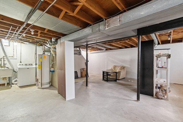 2374 Berwick Dr, Canton, MI 48188 - unfinished basement featuring washer / dryer, gas water heater, and a sink