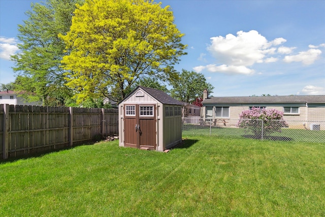 2374 Berwick Dr, Canton, MI 48188 - view of yard with an outdoor structure and a storage unit