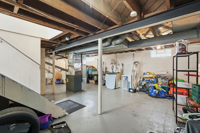 19433 Fenmore St, Detroit, MI 48235 - below grade area featuring healthy amount of natural light and heating unit
