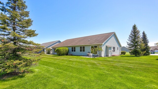1 Sanctuary Way, Freeland, MI 48623 - rear view of property with a lawn