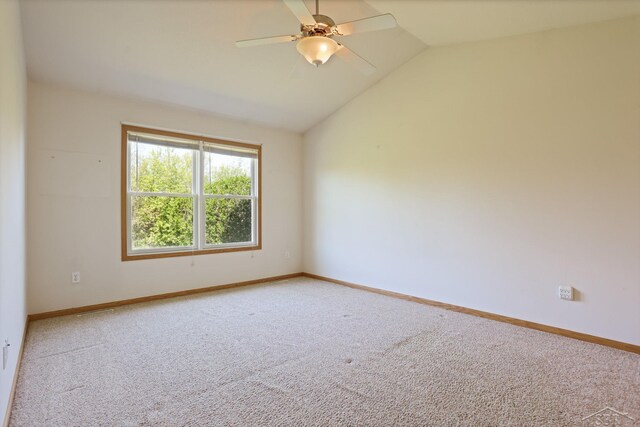 1 Sanctuary Way, Freeland, MI 48623 - spare room with light colored carpet, lofted ceiling, baseboards, and a ceiling fan