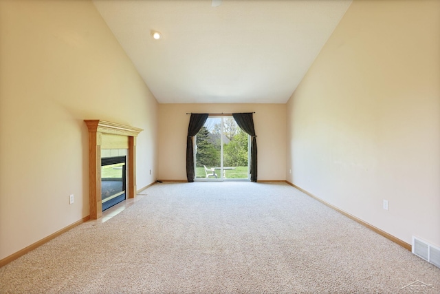 1 Sanctuary Way, Freeland, MI 48623 - carpeted spare room with a fireplace, baseboards, and high vaulted ceiling